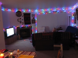 Our decorated living room with Dad on the couch