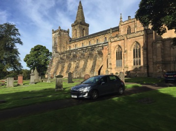 Beautiful sunny day for a tour!  Unusual weather for Scotland.  Churchyard and flying buttresses at abbey.