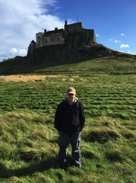 Holy Island walk.  Strong wind, bright sun.